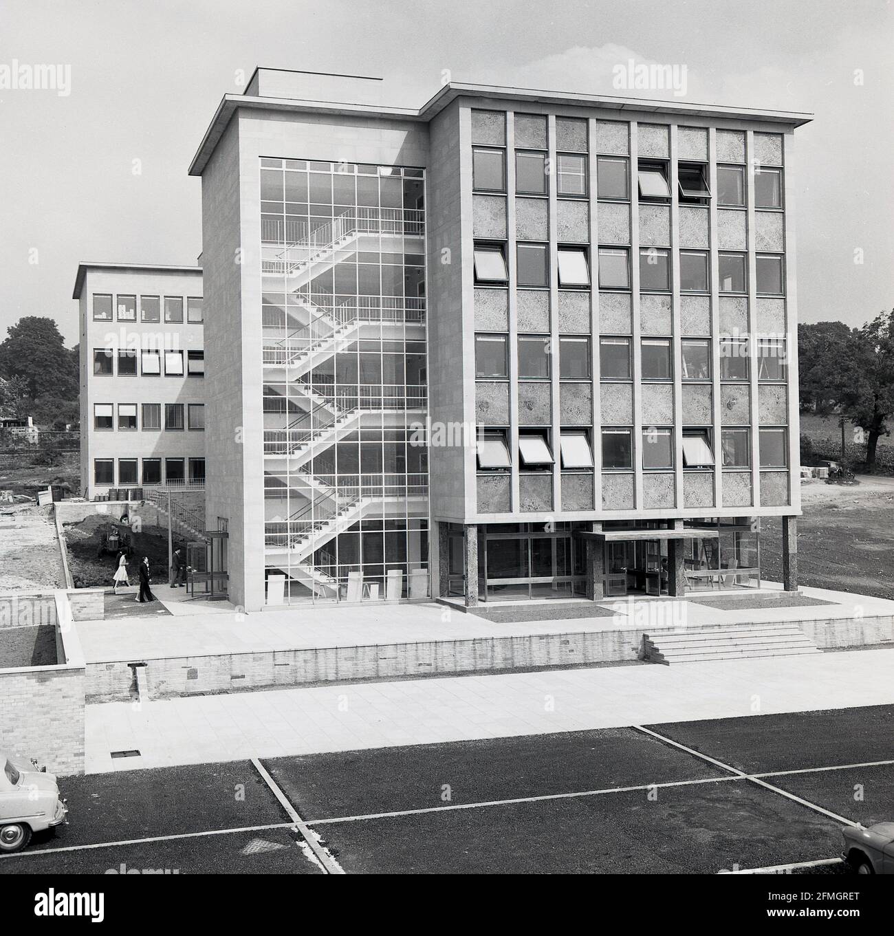 1960s, historical, a newly built head office premises, quite typical of the era's architecture having been built using precast concrete panels with windows already in place, these panels having been built off-site, England, UK. Interesting enough the staircase for the building can be seen, a recent innovation. Stock Photo