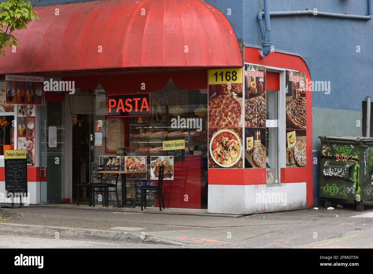 A small restaurant advertises pasta for sale along Denman Street in the West End district in Vancouver, British Columbia, Canada Stock Photo