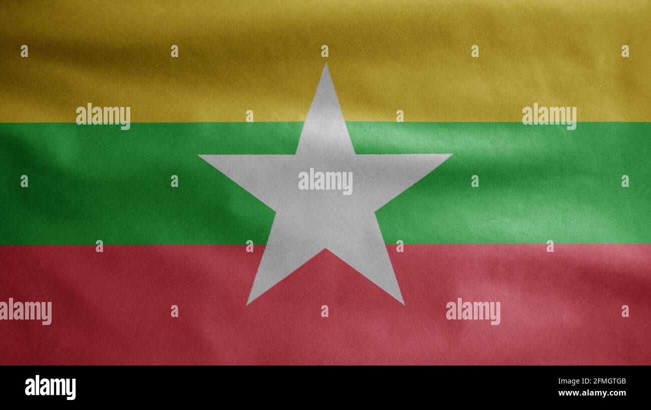 Myanmar flag waving in the wind. Close up of Burma banner blowing, soft ...