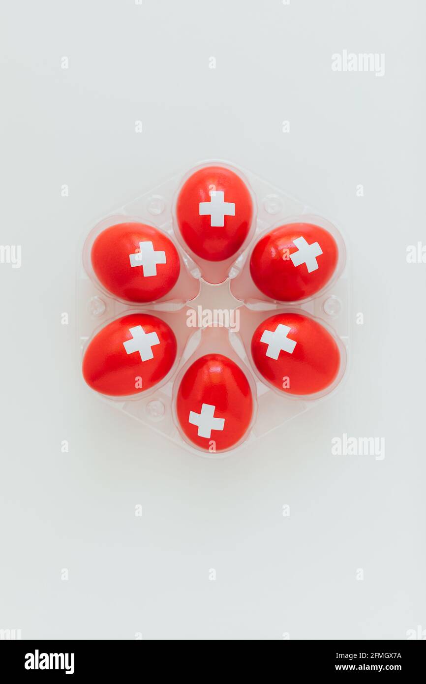 Celebrating Swiss National Holiday on August 1st with traditional eggs  colored like swiss flag. Traditional brunch on the day of the Swiss  Confederacy Stock Photo - Alamy