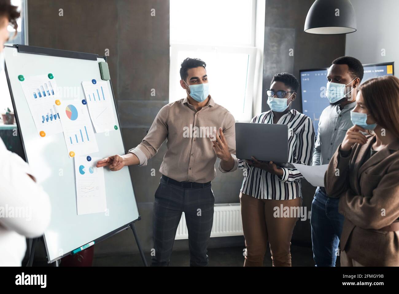 Office mask meeting arab hi-res stock photography and images - Alamy