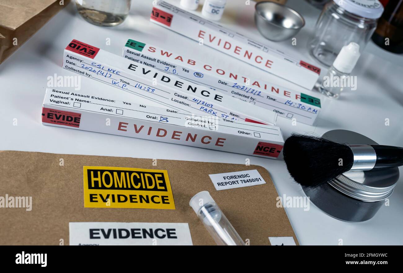 Files and evidence bag in a crime lab, conceptual image Stock Photo - Alamy