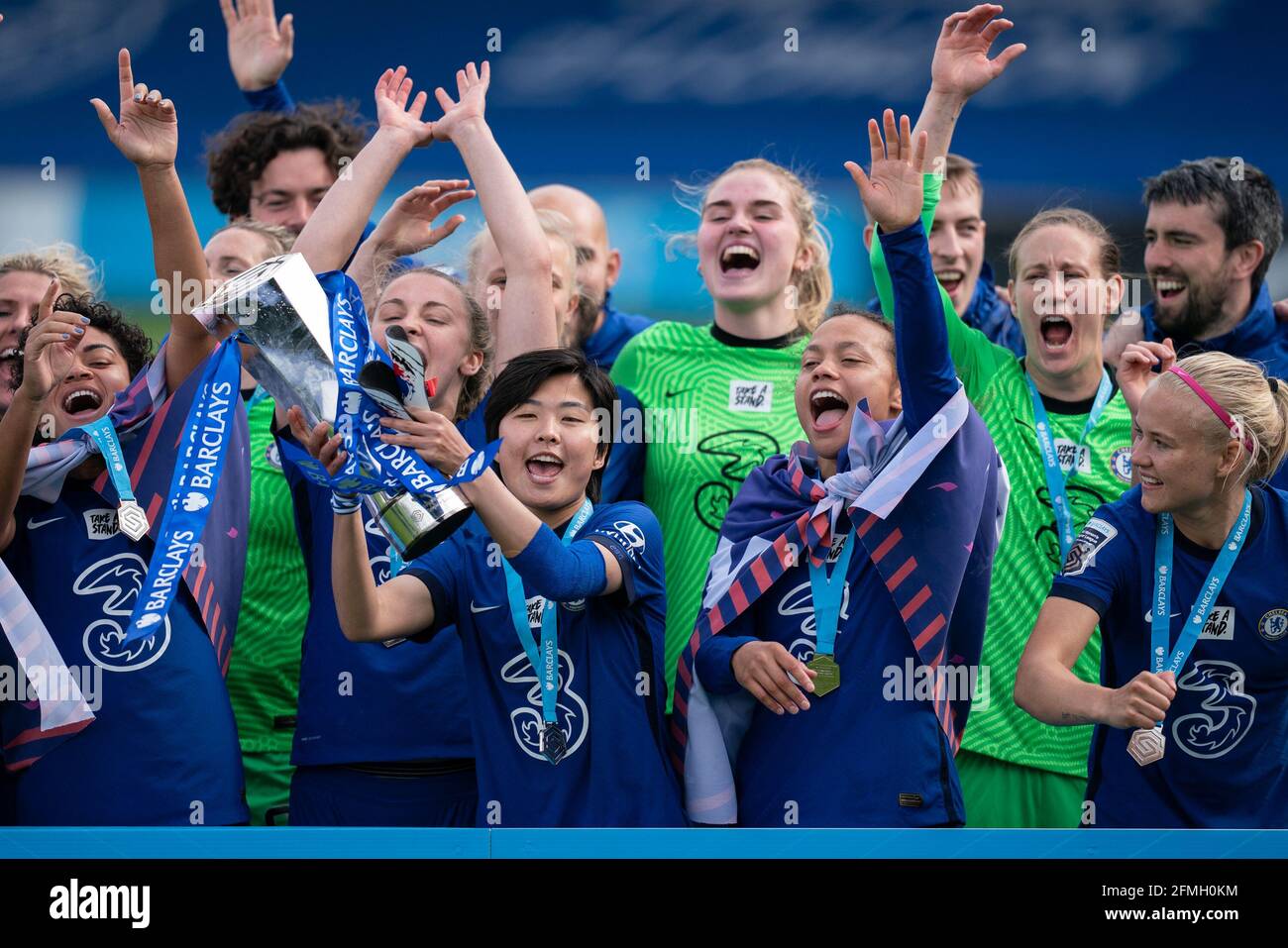 Kingston, UK. 09th May, 2021. Ji So-yun and teammates celebrate with the winning trophy after the team are crowned 2020/21 FAWSL champions during the FAWSL match between Chelsea Women and Reading Women at the Kingsmeadow Stadium, Kingston, England on 9 May 2021. Photo by Andy Rowland. Credit: PRiME Media Images/Alamy Live News Stock Photo