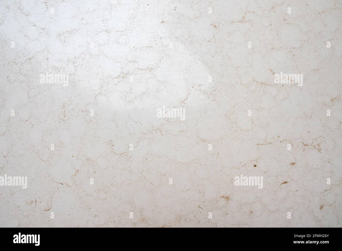Brown grainy texture on white background. Stock Photo