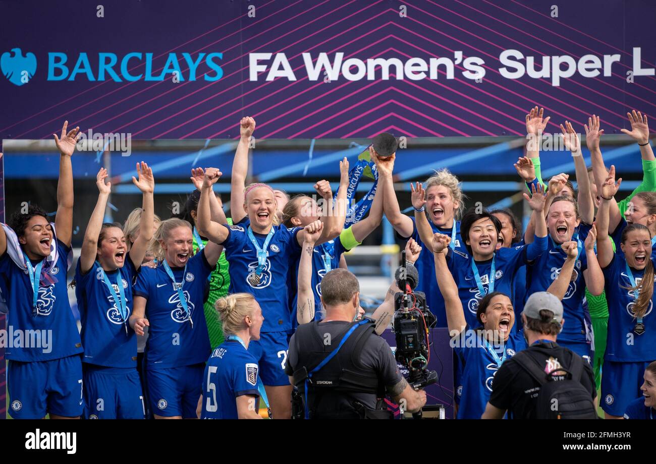 Kingston, UK. 09th May, 2021. Chelsea Women celebrate with the winning trophy after the team are crowned 2020/21 FAWSL champions during the FAWSL match between Chelsea Women and Reading Women at the Kingsmeadow Stadium, Kingston, England on 9 May 2021. Photo by Andy Rowland. Credit: PRiME Media Images/Alamy Live News Stock Photo