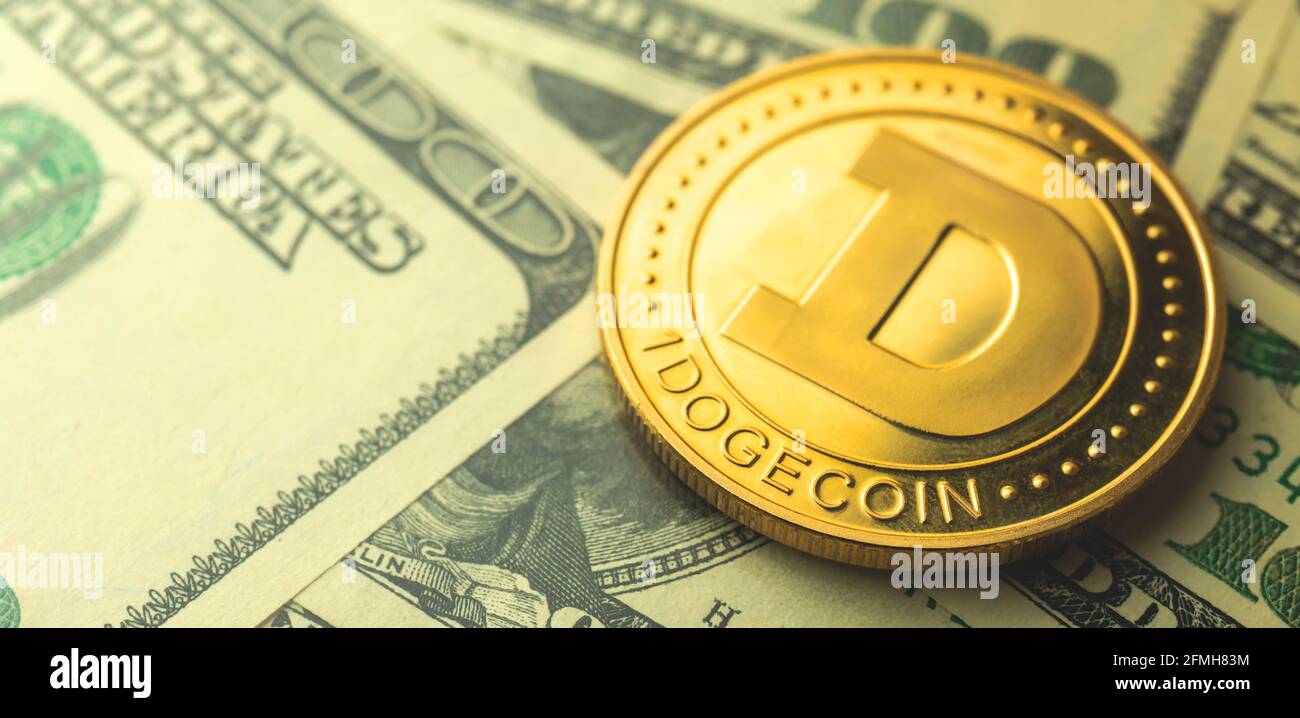 Banner one dogecoin against US dollars on the background, cryptocurrency  business concept Stock Photo - Alamy