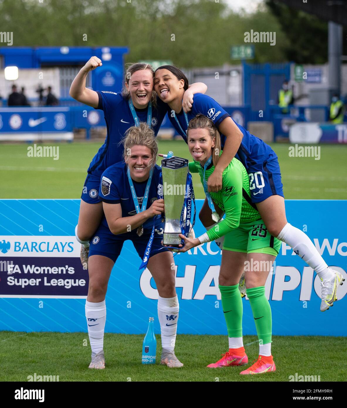 Kingston, UK. 09th May, 2021. Millie Bright, Erin Cuthbert, Sam Kerr & Goalkeeper Carly Telford of Chelsea Women celebrate after the team are crowned 2020/21 FAWSL champions during the FAWSL match between Chelsea Women and Reading Women at the Kingsmeadow Stadium, Kingston, England on 9 May 2021. Photo by Andy Rowland. Credit: PRiME Media Images/Alamy Live News Stock Photo
