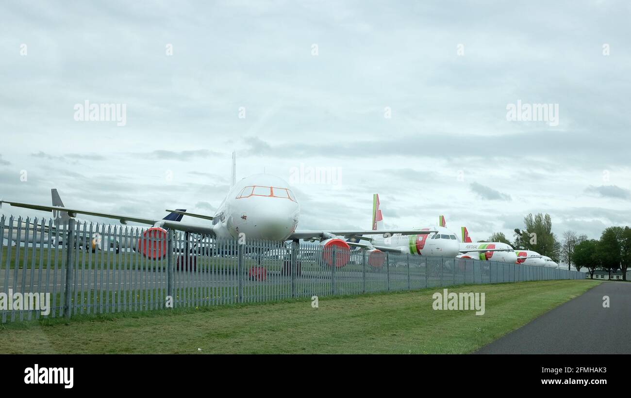 May 2021 - Old jet planes standing at Kemble airport in the Cotswolds England, awaiting breaking up, most already have their engines removed. Stock Photo