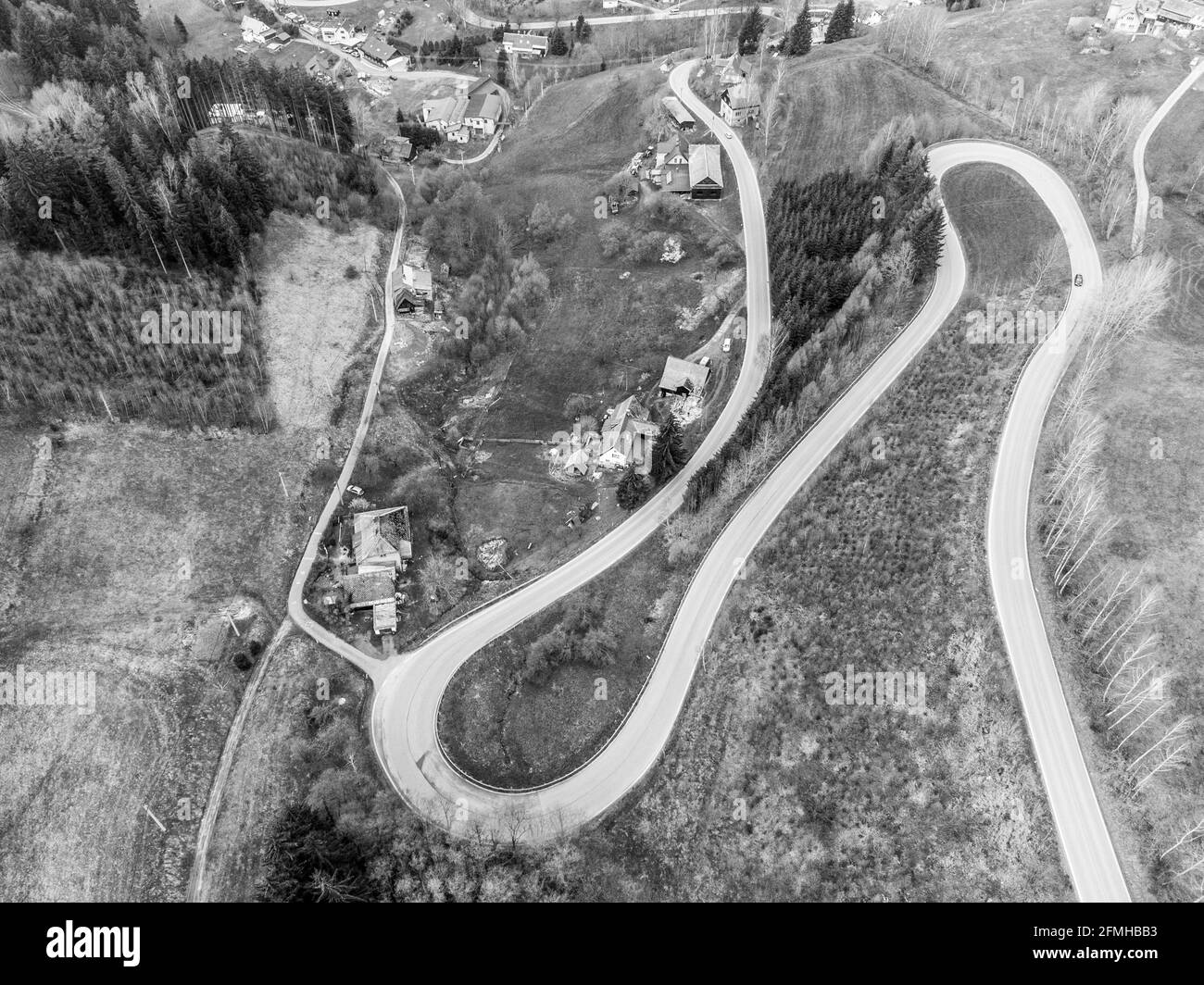 Asphalt road serpentine from above Stock Photo