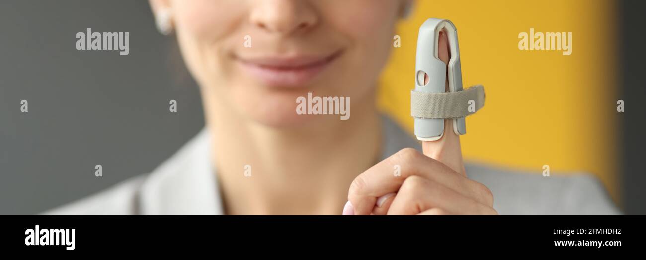 Orthopedic orthosis fixing joints of finger hand closeup Stock Photo