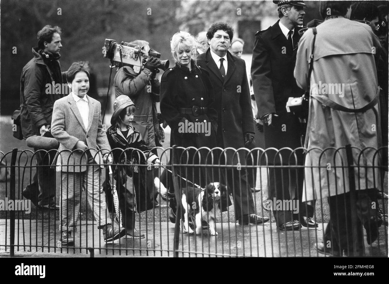 Nigel Lawson Chancellor of the Exchequer and his family (plus Tigger) take the traditional walk in St James Park Stock Photo