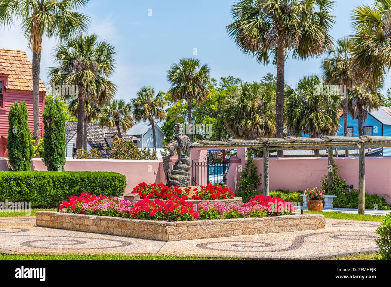 St. Augustine, USA - May 10, 2018: Garden near St George Street Frank D. Upchurch park in downtown old town Florida city and colorful flowers+ Stock Photo