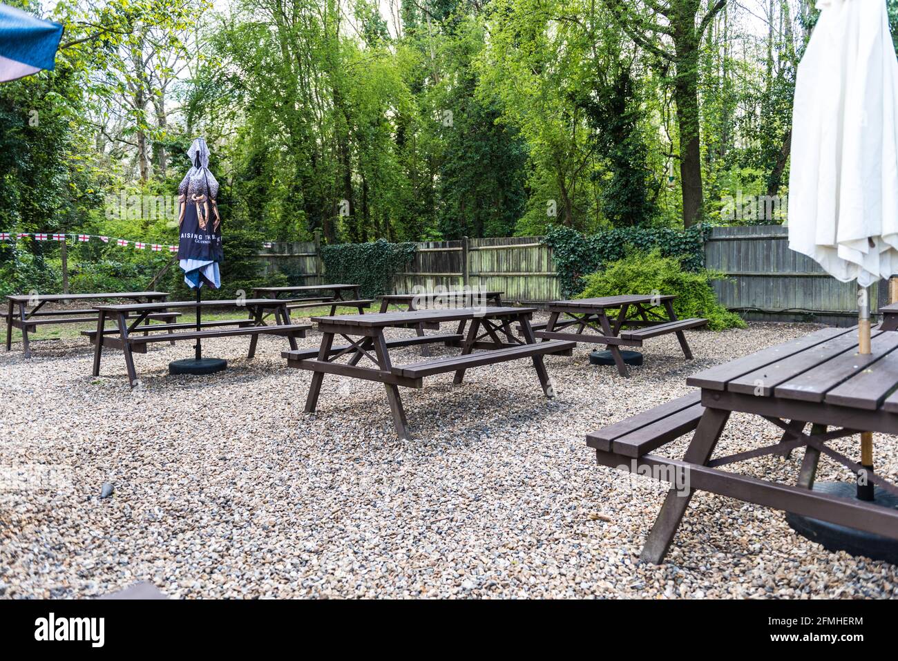 Outdoor pub seating wooden tables Stock Photo Alamy