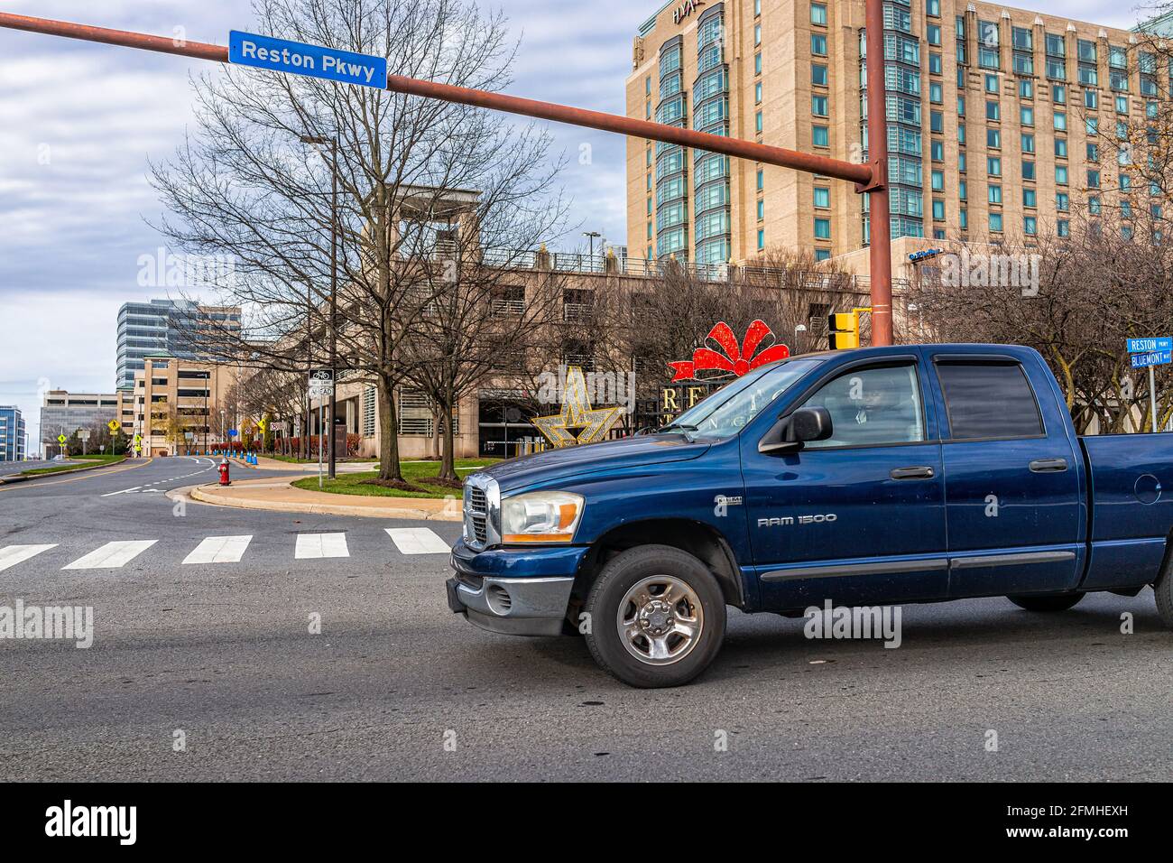 Reston, USA December 7, 2020 Reston town center buildings with car