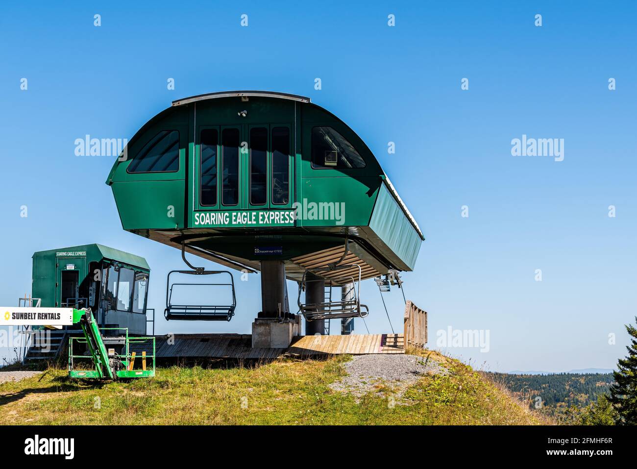 Snowshoe, USA - October 6, 2020: Soaring Eagle Express ski lift funicular sign by rental equipment from Sunbelt Rentals in ski resort town village of Stock Photo