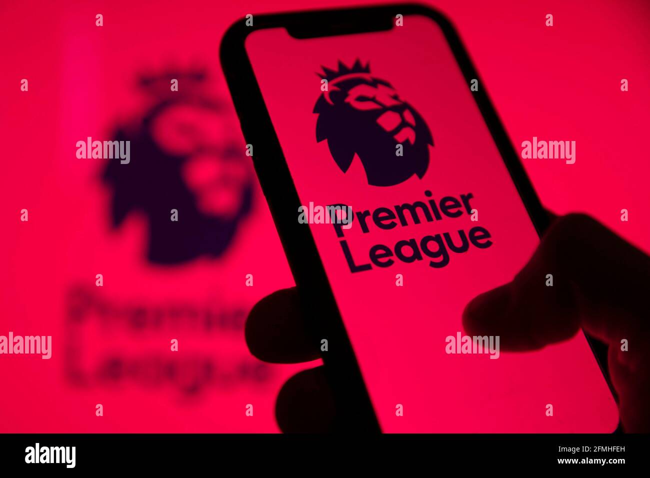 LONDON, UK - May 2021: Premier league football logo on a smartphone screen Stock Photo