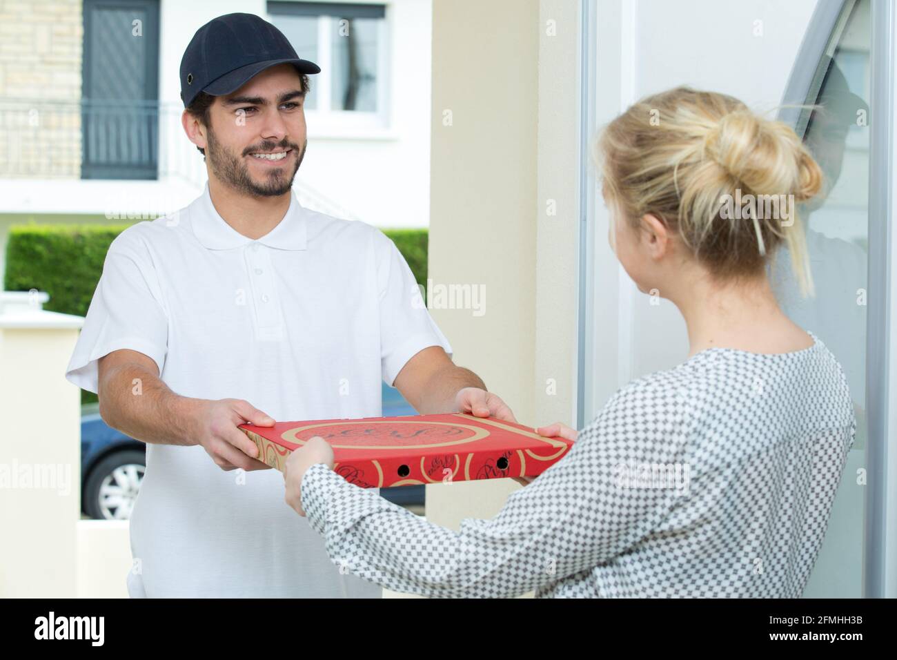 man delivering pizza Stock Photo Alamy