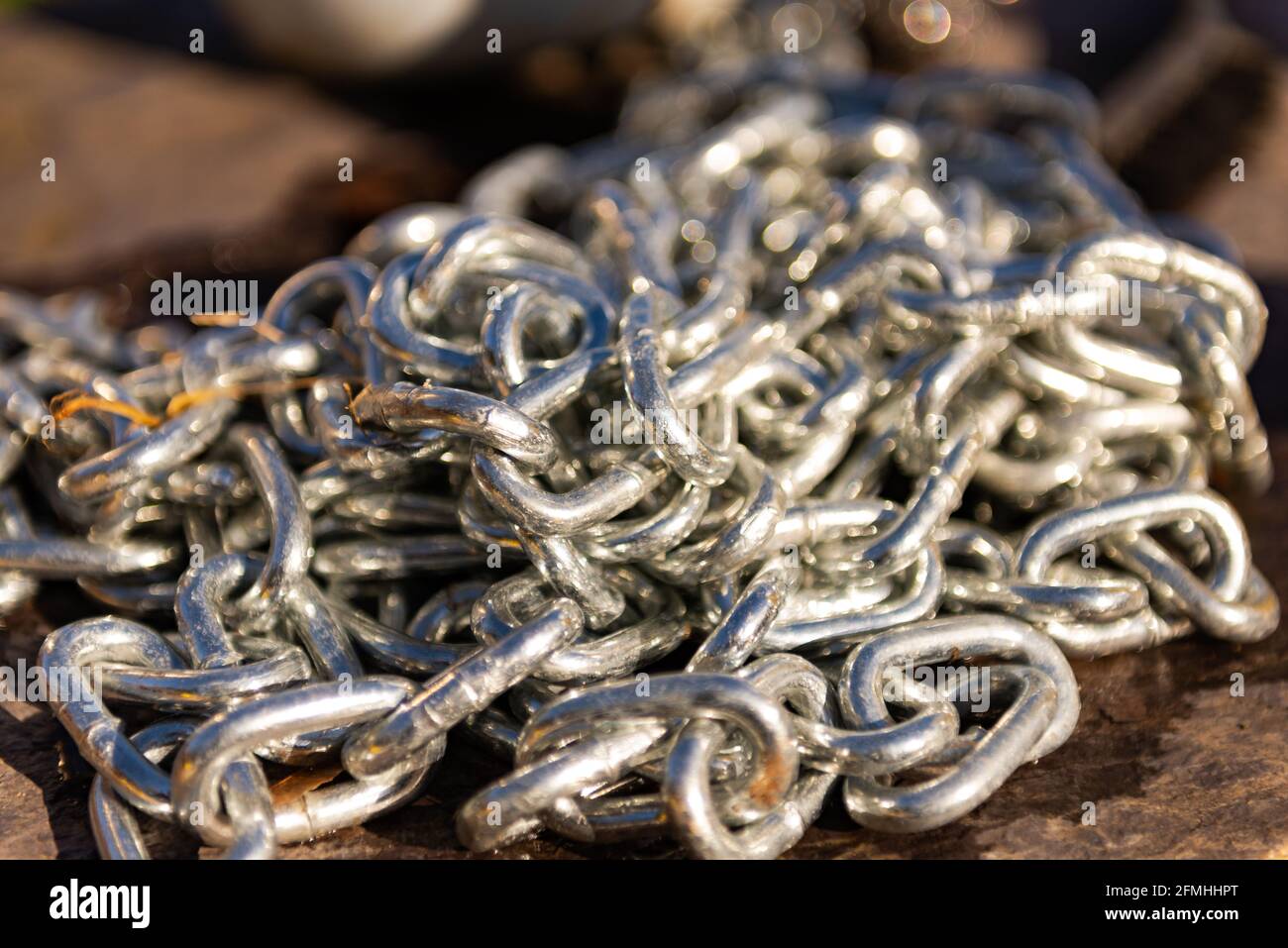 Pile metal chain steel hi-res stock photography and images - Alamy