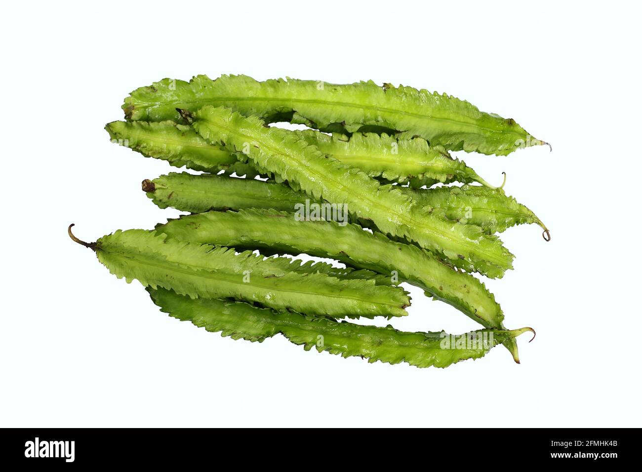 Overhead view of few isolated green winged bean pods Stock Photo
