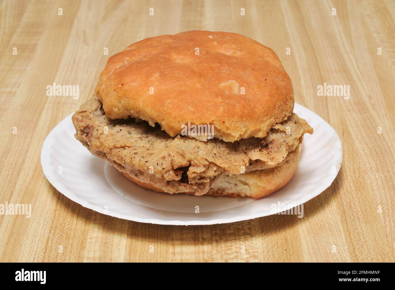 Delicious southern fried steak biscuit breakfast sandwich Stock Photo