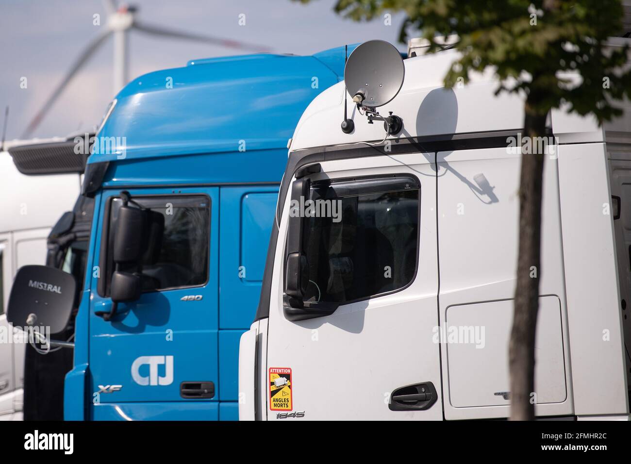 Worms, Germany. 02nd May, 2021. Trucks parked at a rest area on the 61 freeway. Credit: Sebastian Gollnow/dpa/Alamy Live News Stock Photo