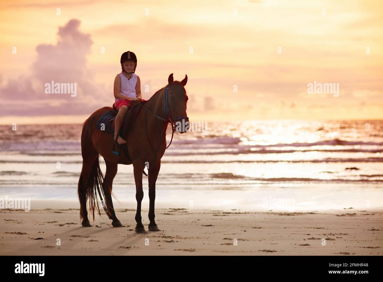 Child horse riding helmet sand hi-res 