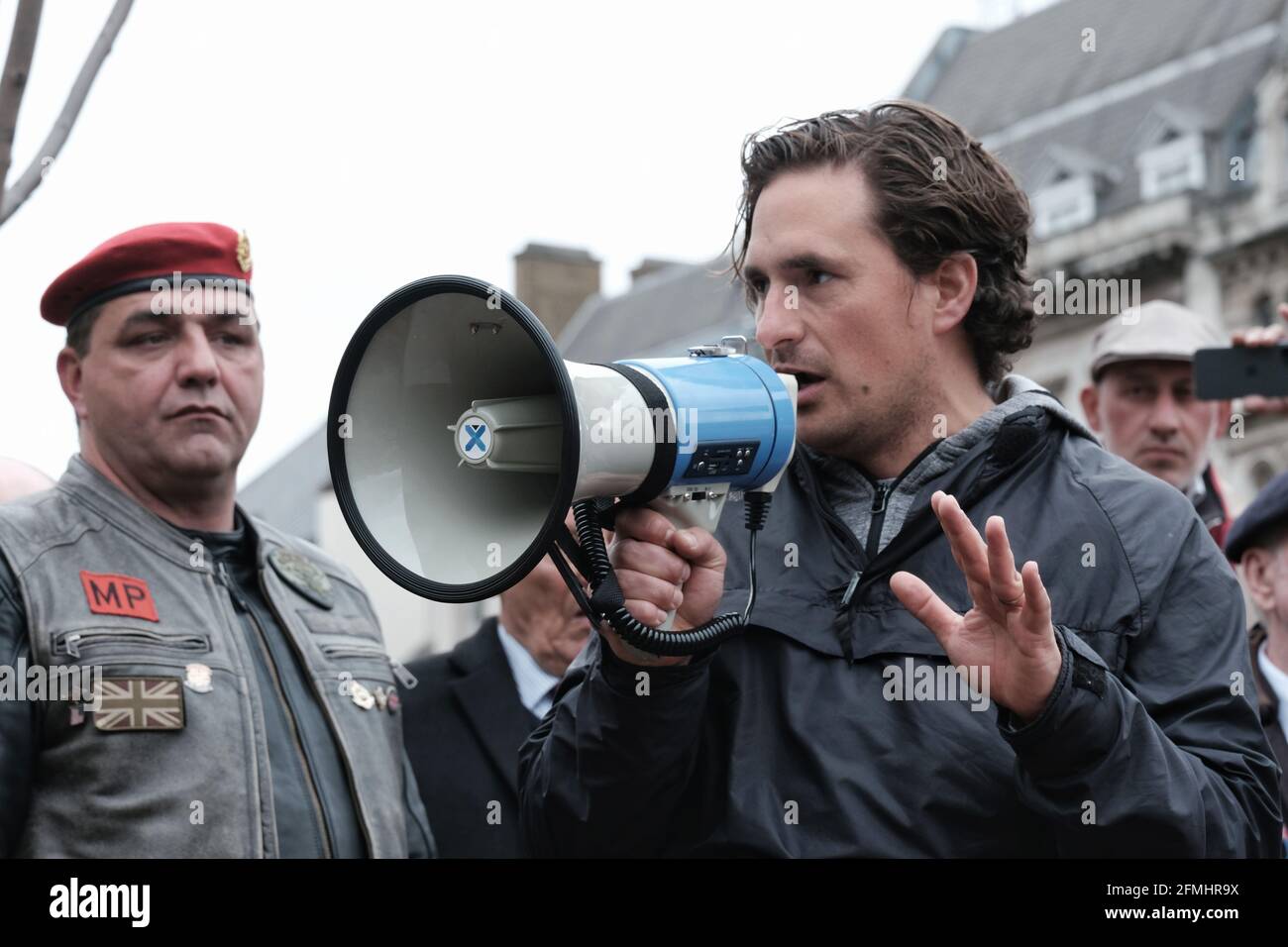Former defence minister MP Johnny Mercer adresses a crowd at an event