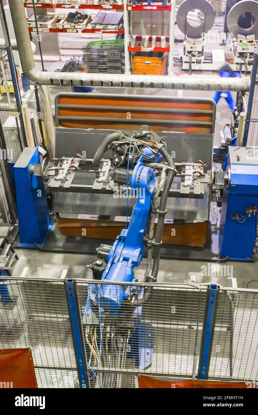 Welding robot in the process. Modern welding production. Stock Photo