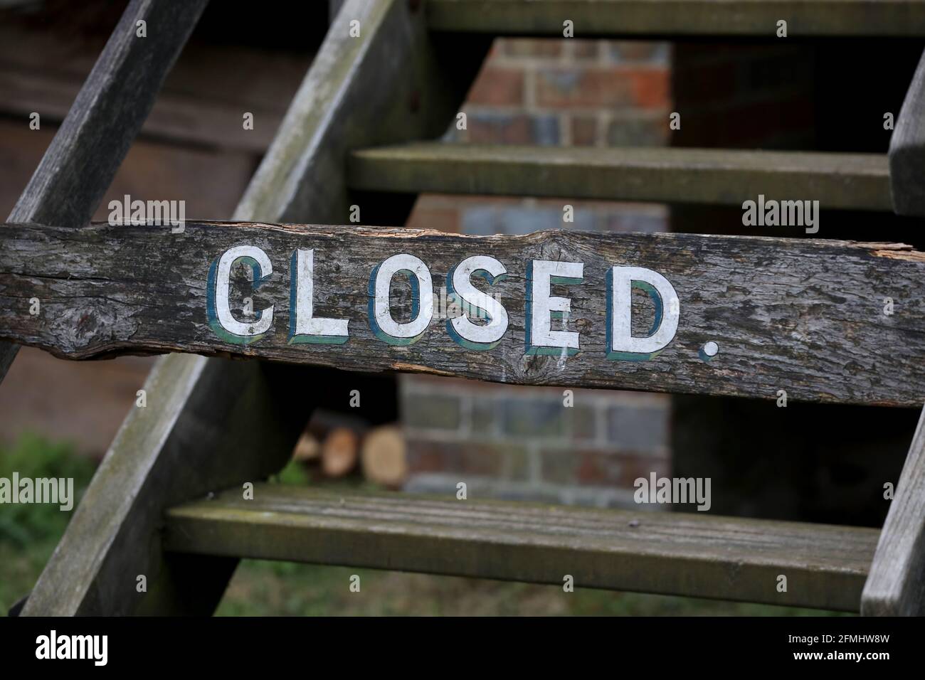 A closed sign on a set of stairs at the Weald & Downland Living Museum in Singleton, Chichester, West Sussex, UK. Stock Photo