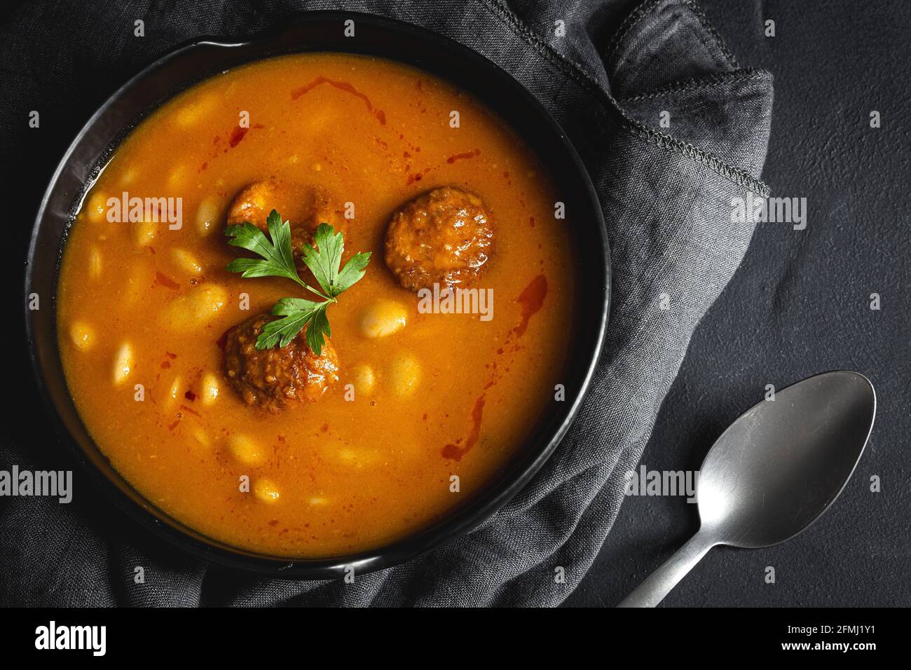 Delicious plate of beans with chorizo seen from above Stock Photo - Alamy