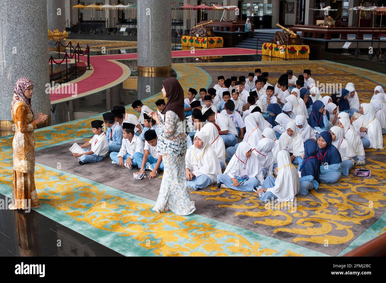 Teachers and class at the museum, Brunei Stock Photo
