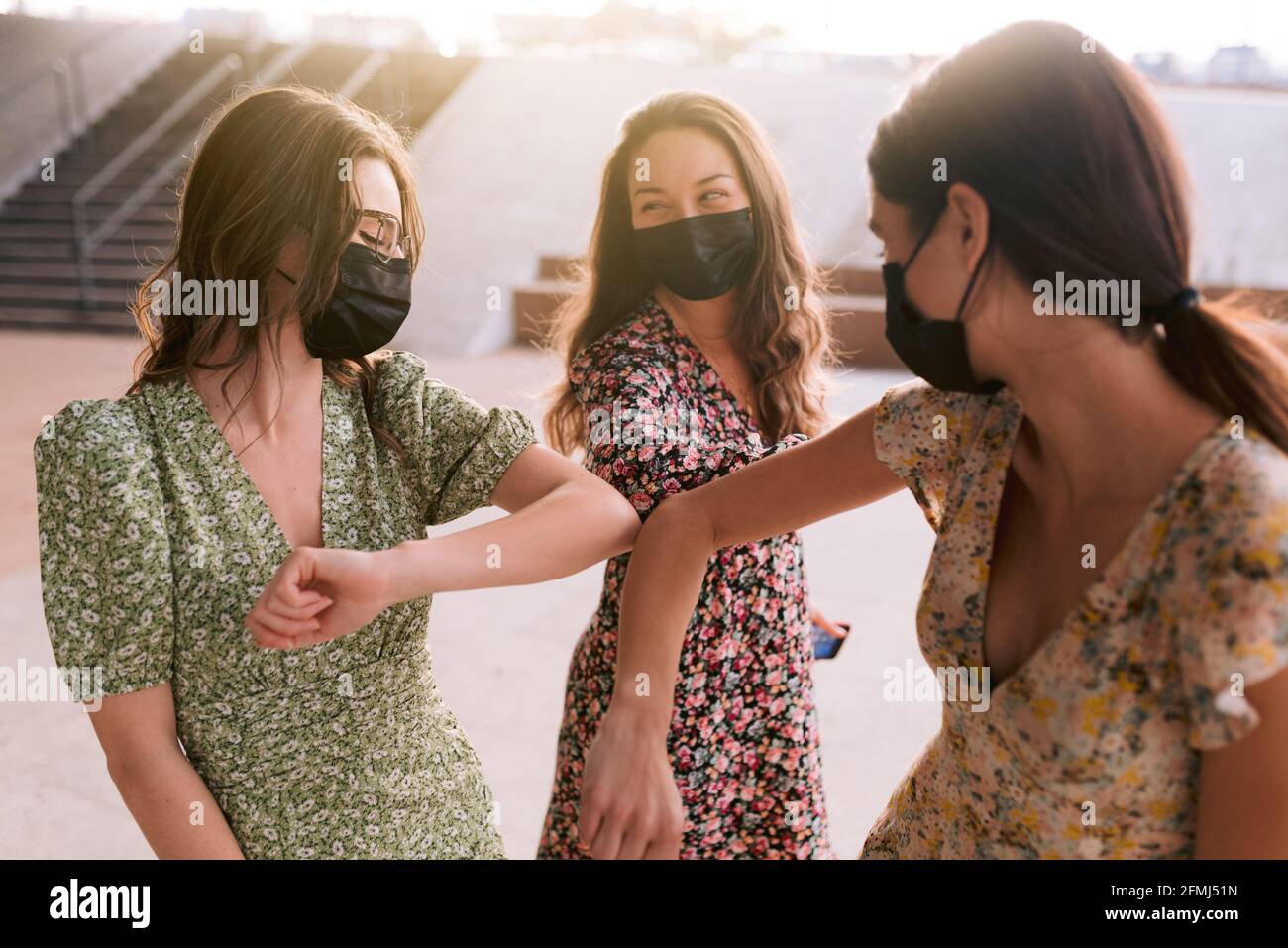 Touching elbows hires stock photography and images Alamy