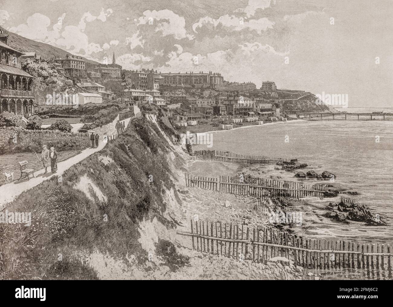 A late 19th Century view of Ventnor, a seaside resort and civil parish established in the Victorian era on the southeast coast of the Isle of Wight, England. Situated on steep slopes leading down to the sea. Ventnor became extremely fashionable as both a health and holiday resort in the late 19th century, described as the 'English Mediterranean' and 'Mayfair by the Sea'. Stock Photo