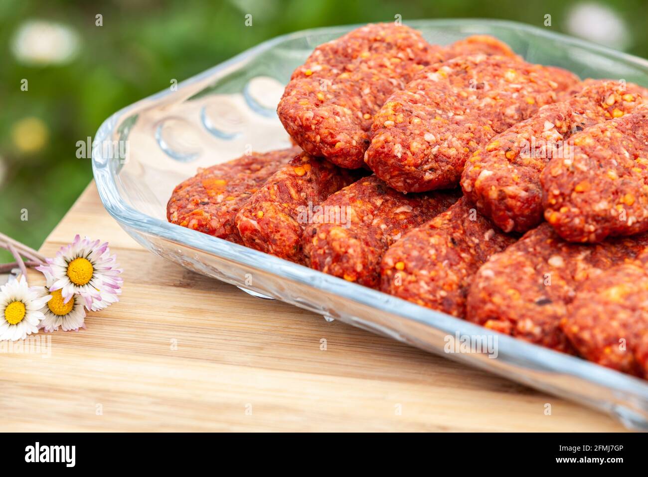meatballs plate ready for grilling in picnic Stock Photo