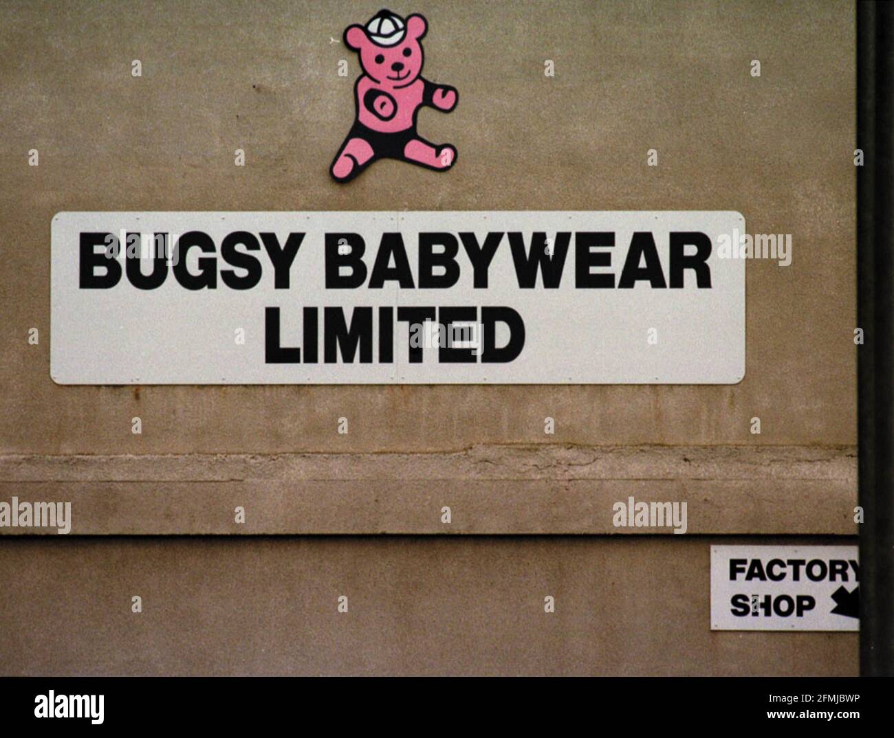 Bugsy Babywear clothing factory  Oct 1999 Sign on the side of the Bugsy Babywear clothing factory in West Bromwich. Stock Photo
