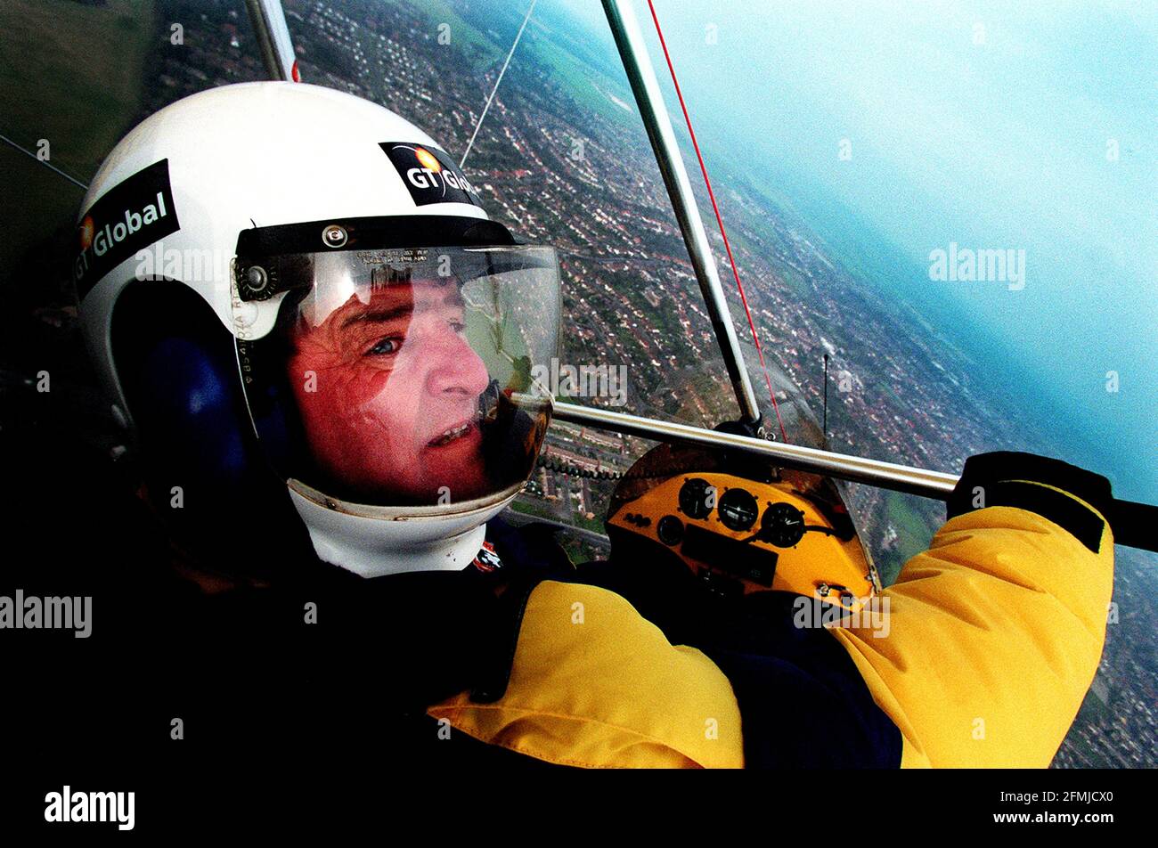 Brian Milton microlight pilot February 1998 Brian Milton 55 at the helm of his single engined micro light gt global flyer-, which he and co pilot keith reynolds will attempt to be the first microlight to circumnavigate the globe they will overfly 25 countries  24301 miles around the world in 80 consecutive  days on the 125th anniversery of the publication of jules verne's 'around the world in eighty days Stock Photo