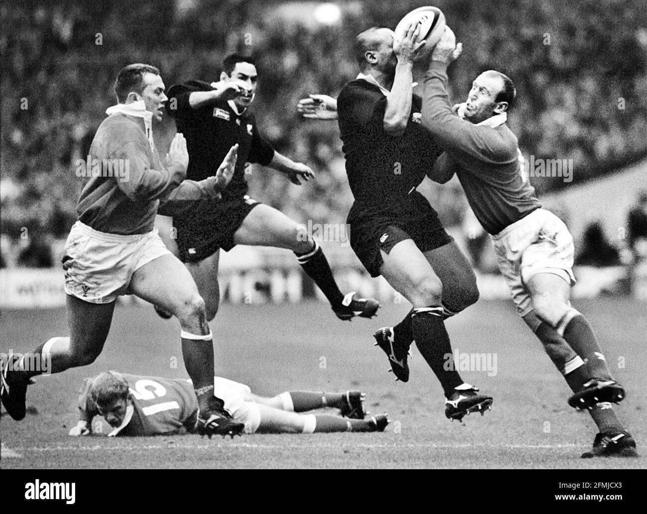 Jonah Lomu All Black winger finds progress blocked 1997 towards the line at Wembley by Gareth Thomas of Wales Stock Photo