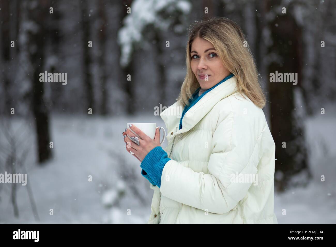 Mug And Thermos Of Hot Chocolate On A Cold Winter Day Stock Photo, Picture  and Royalty Free Image. Image 12627723.