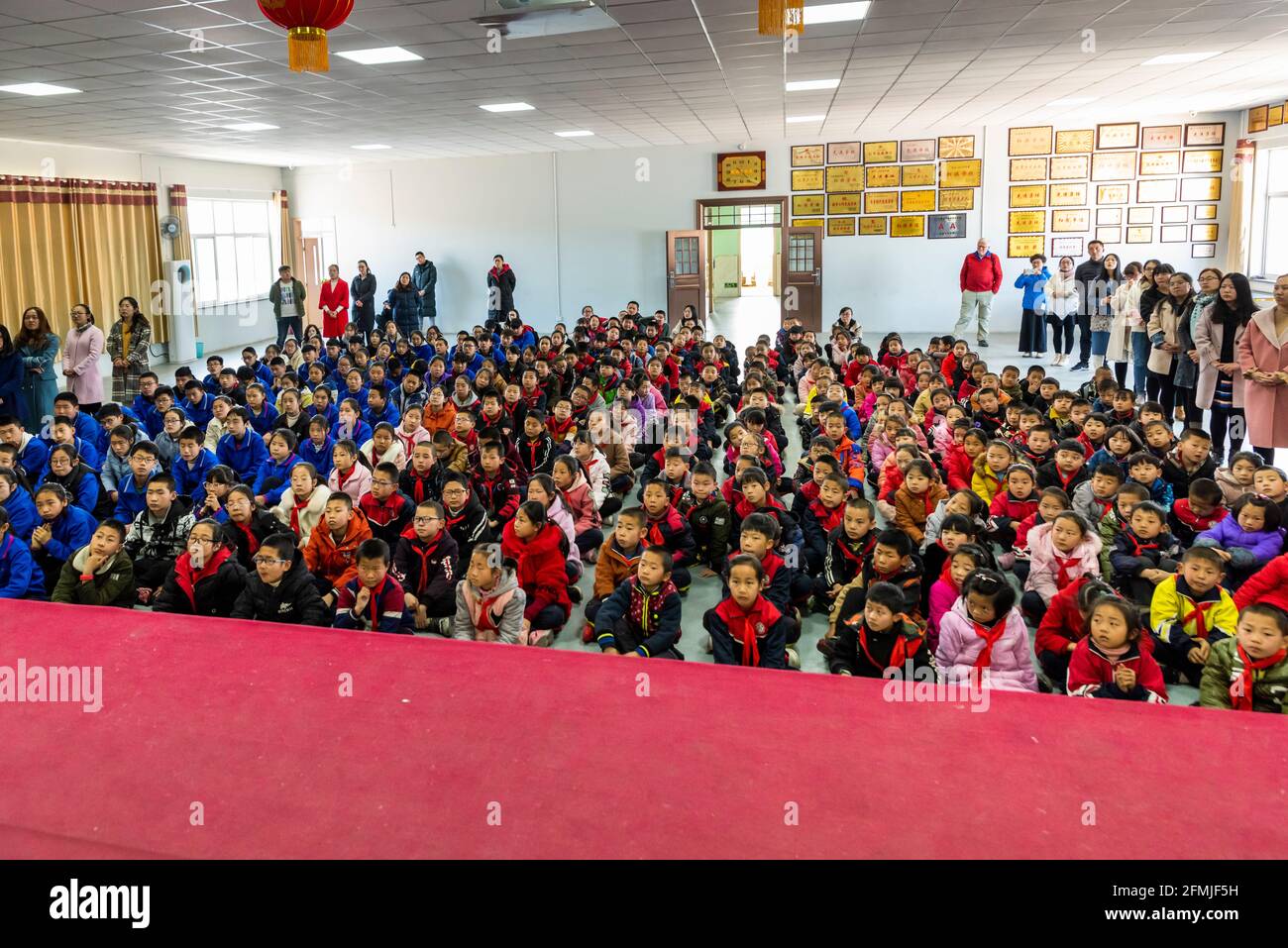 Students at BoAi school prepare for an assembly in a rural school in Shanxi province, China. Stock Photo