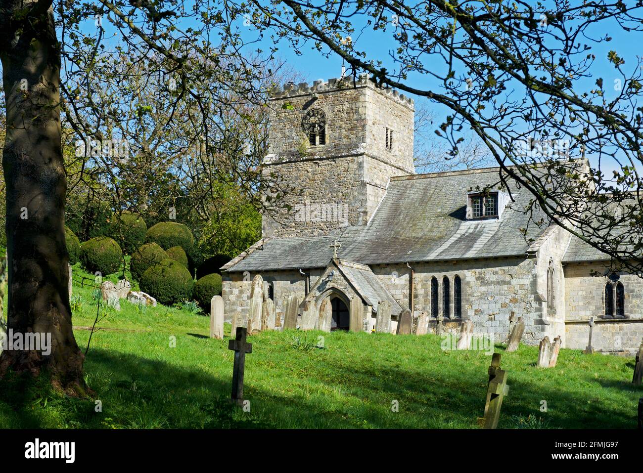 All Saints parish church in the village of Kirby Underdale, North Yorkshire, England UK Stock Photo