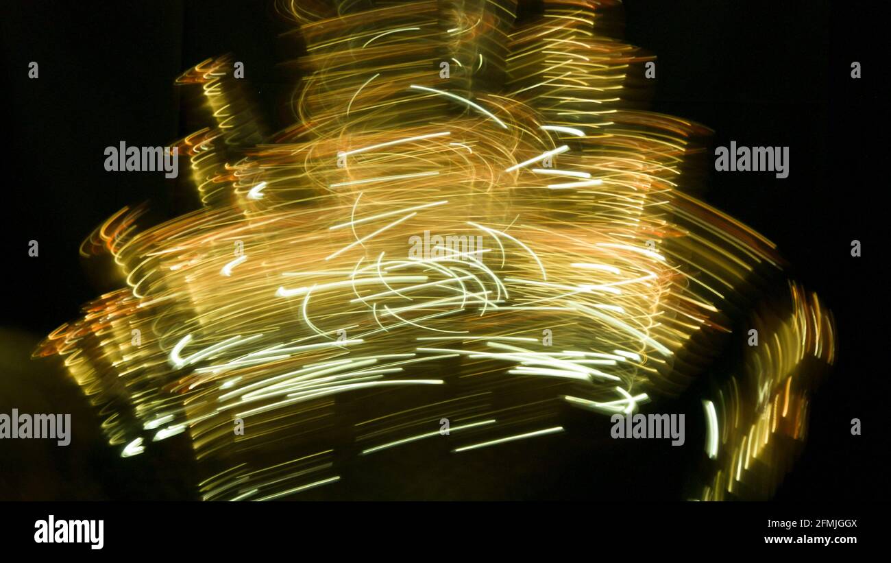 Light painting with circular movements Stock Photo