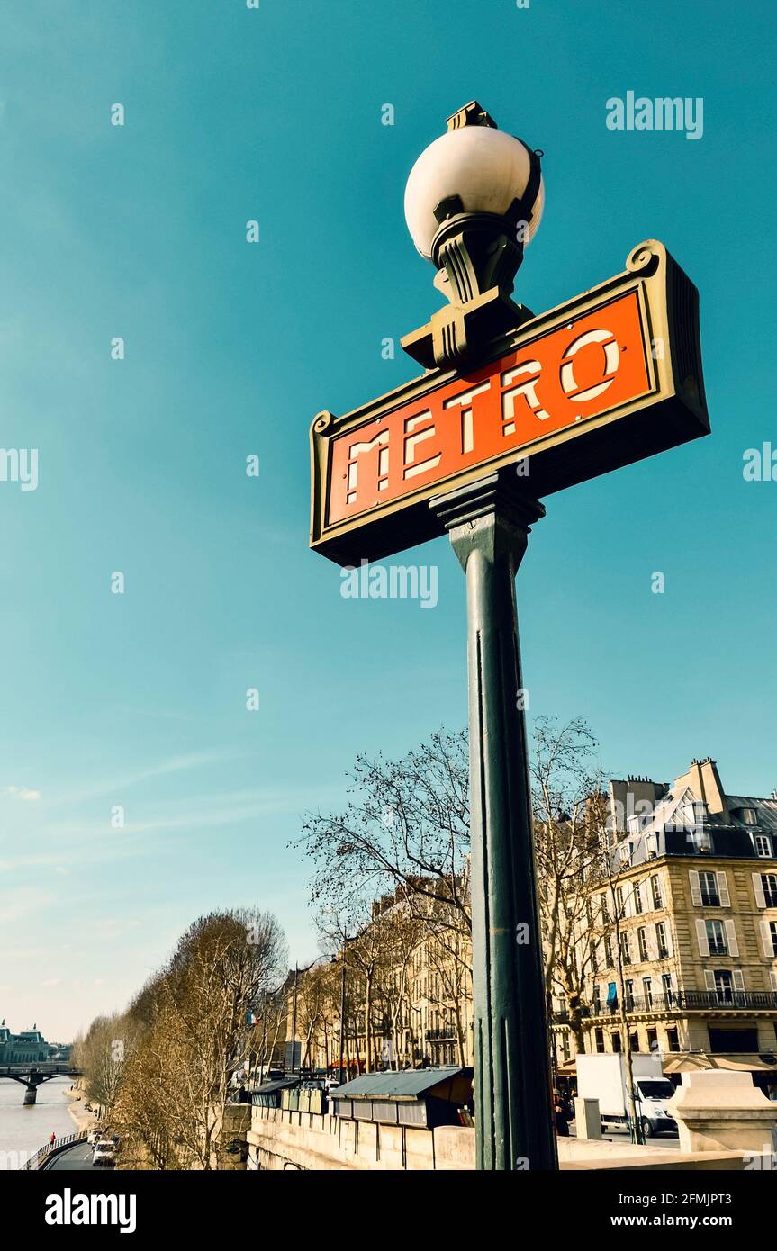 Metro sign in Paris, France. Teal and orange color grading. Stock Photo