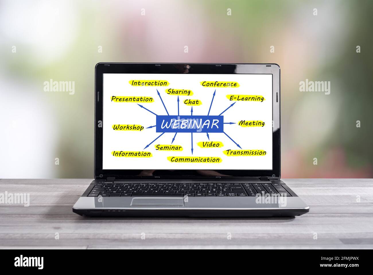 Webinar concept shown on a laptop screen Stock Photo