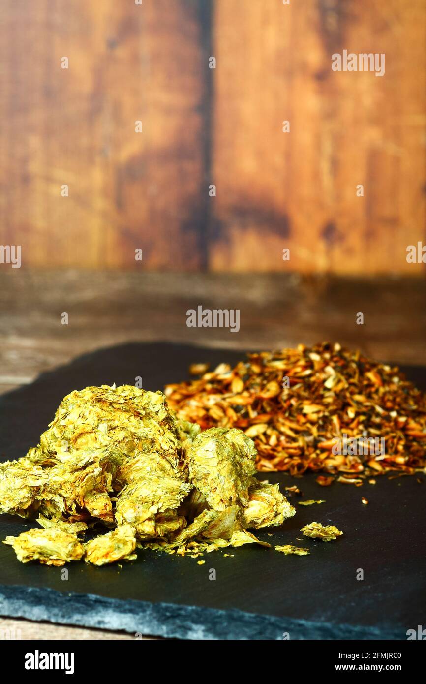 Close up of brewing hops and crystal malt grain the raw ingredients used in brewing beer Stock Photo