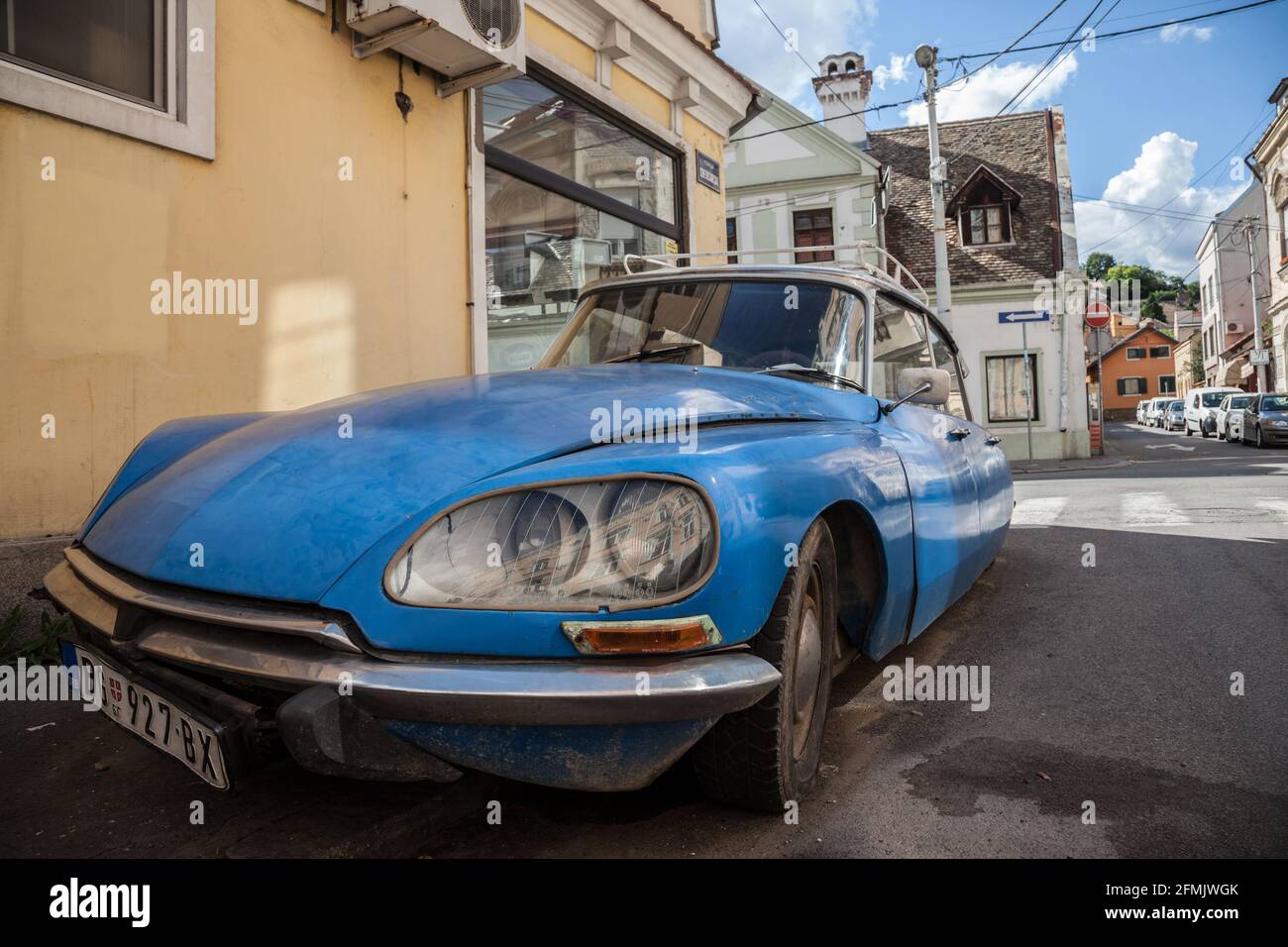 Picture of a blue Citroen DS original parked in the streets of Belgrade, Serbia. The Citroen DS  and its less expensive variant, the Citroen ID, are f Stock Photo