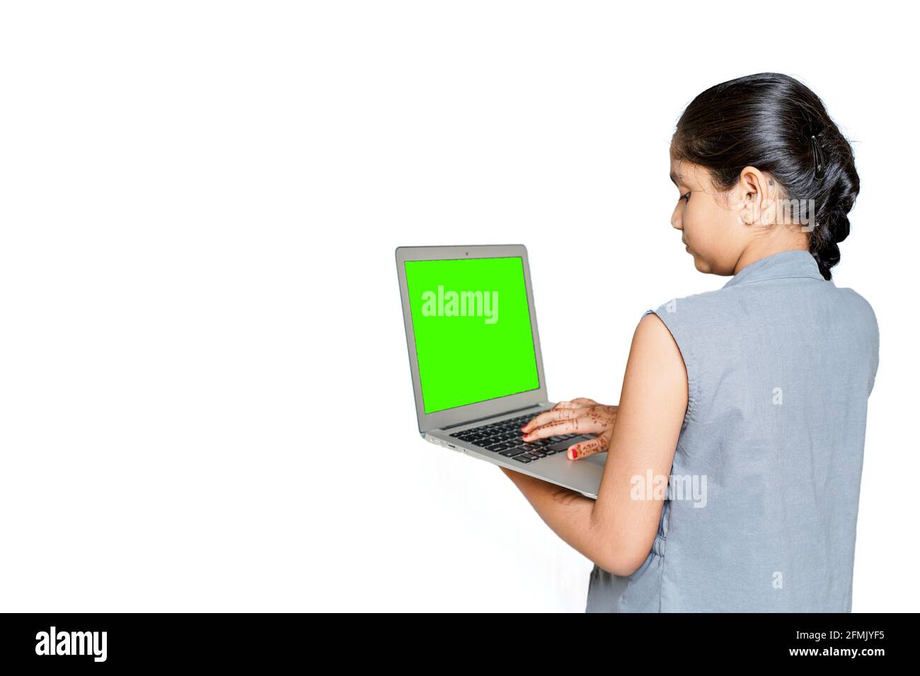 A young Indian girl is attending online school or classes. Study in lock down as Schools closed due to Covid-19. Role of technology during nationwide Stock Photo