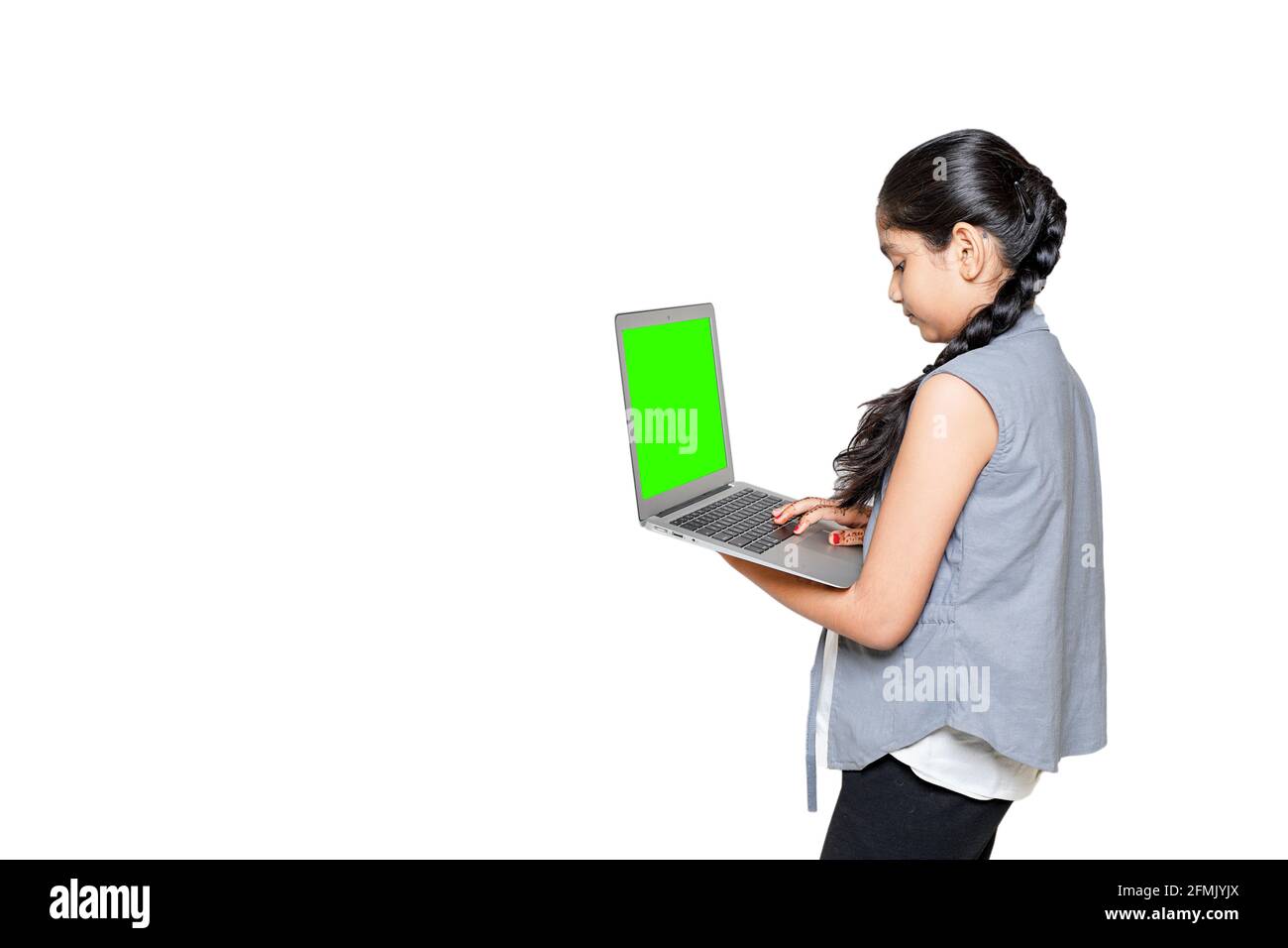 A young Indian girl is attending online school or classes. Study in lock down as Schools closed due to Covid-19. Role of technology during nationwide Stock Photo