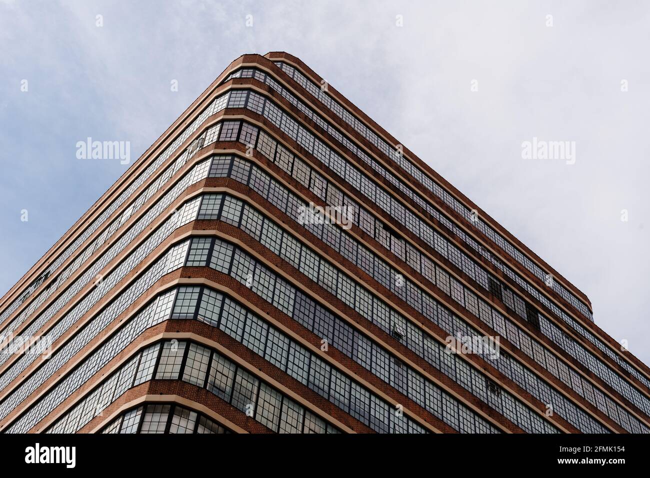 New York City, USA - June 25, 2018: Low angle view of commercial building with warehouses in Tribeca. Stock Photo