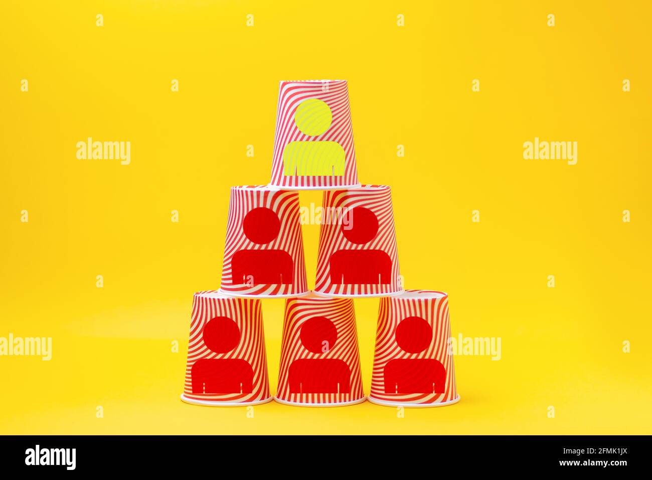 Pyramid of red paper cups on green background. minimalism concept Stock  Photo - Alamy