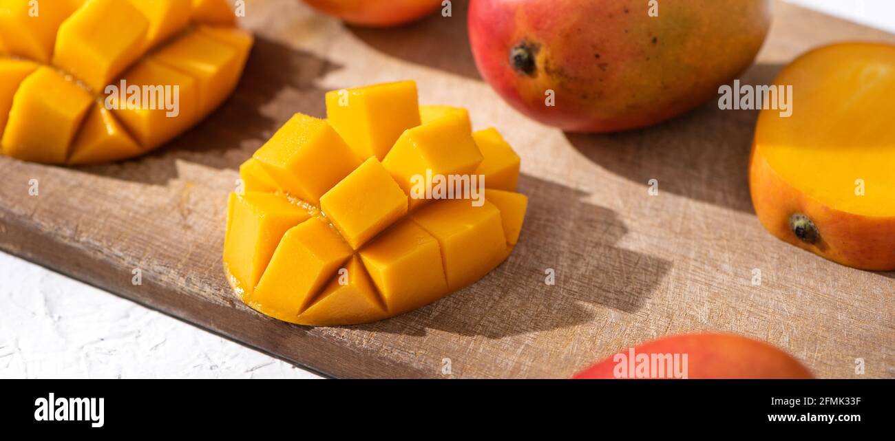 Mango fruit cut in half hires stock photography and images Alamy